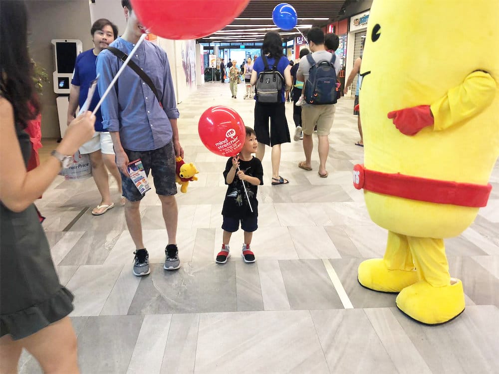 Events Marketing Walkway Flyer Distribution Mindstretcher mascot with child father