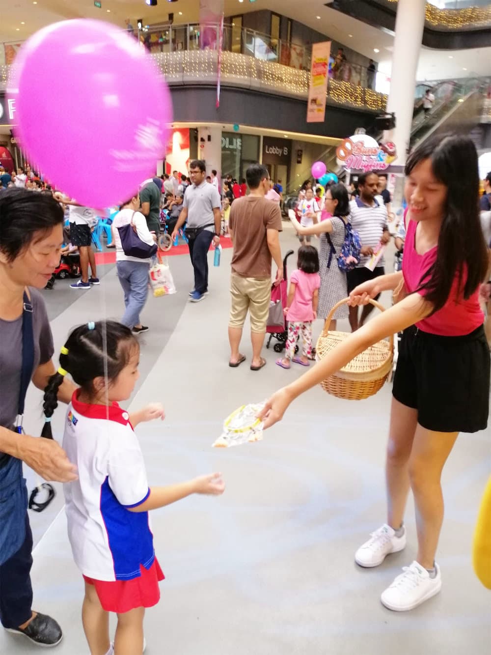 Walkway flyer distribution tampines hub distributor passing flyers