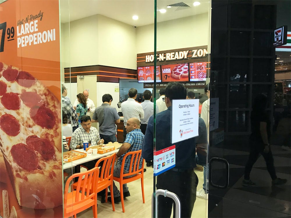 caesar walkway flyer distribution raffles place crowded restaurant 3