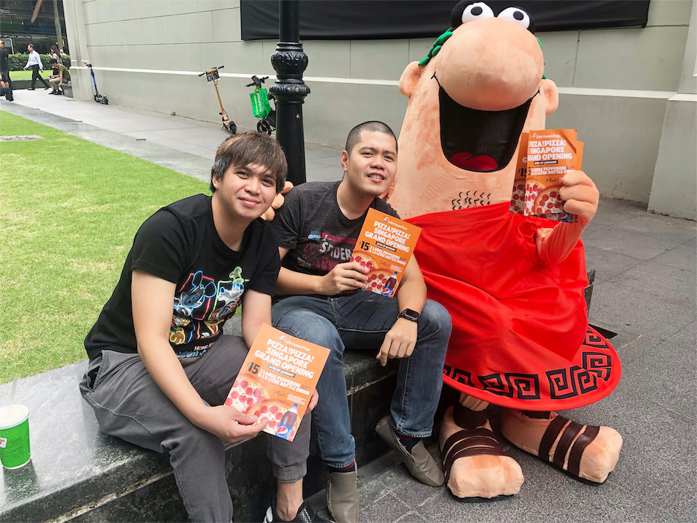 caesar walkway flyer distribution raffles place with mascot and people 3