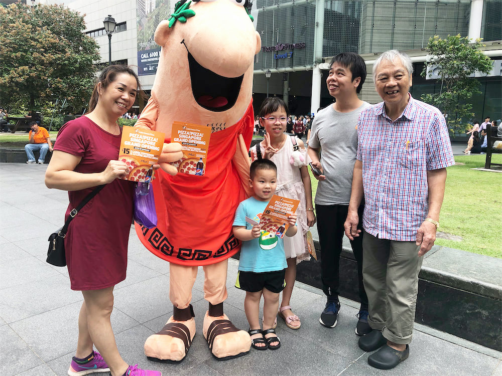 caesar walkway flyer distribution raffles place with mascot and people 4