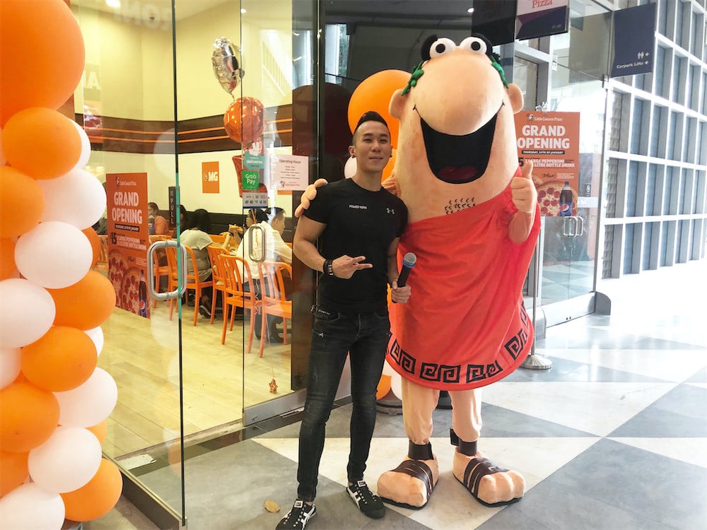 caesar walkway flyer distribution raffles place with mascot and people
