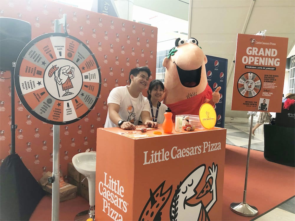 caesar walkway flyer distribution raffles place with mascot