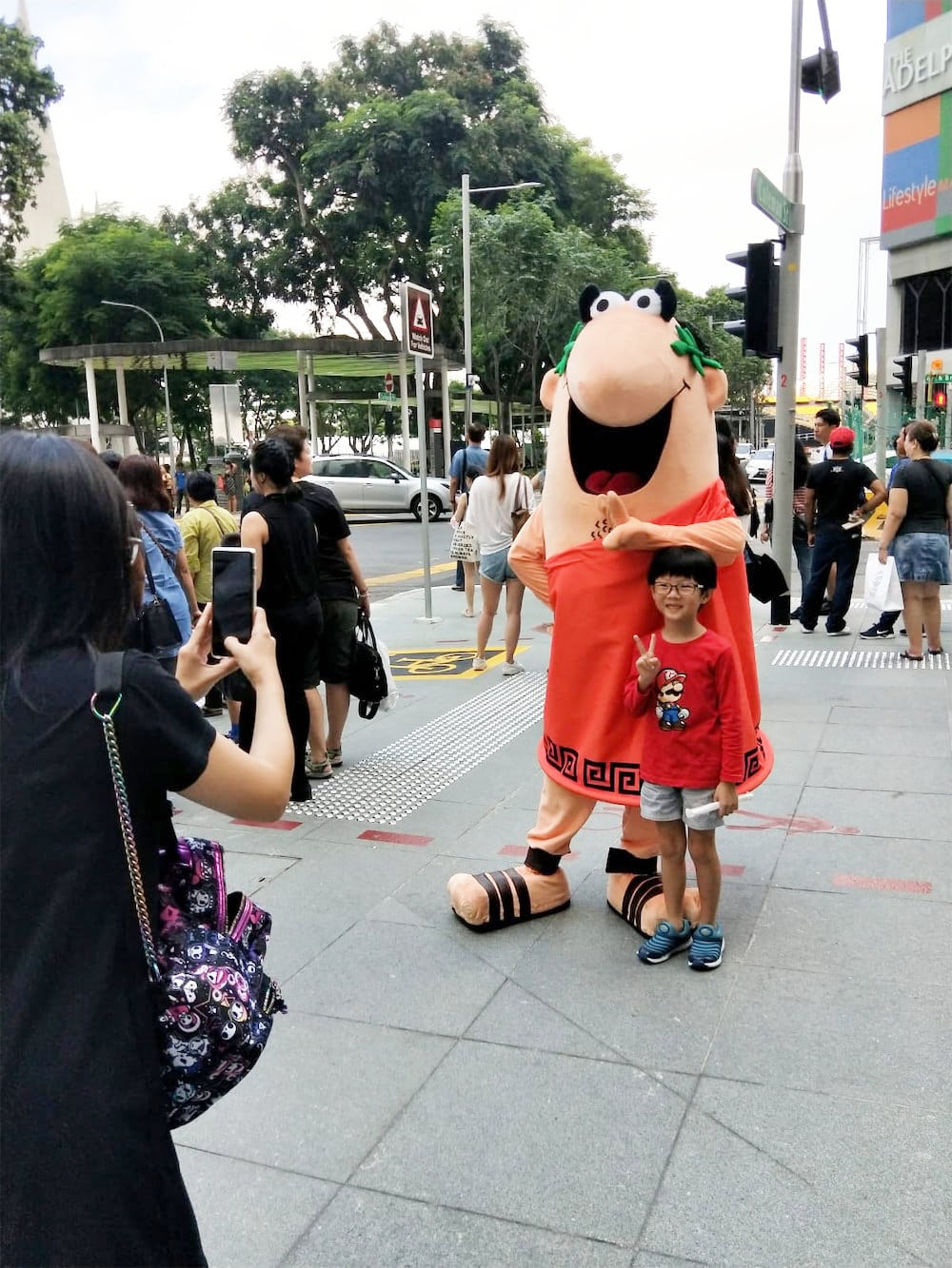 funan caesar pizza walkway mascot flyer distribution with children 2