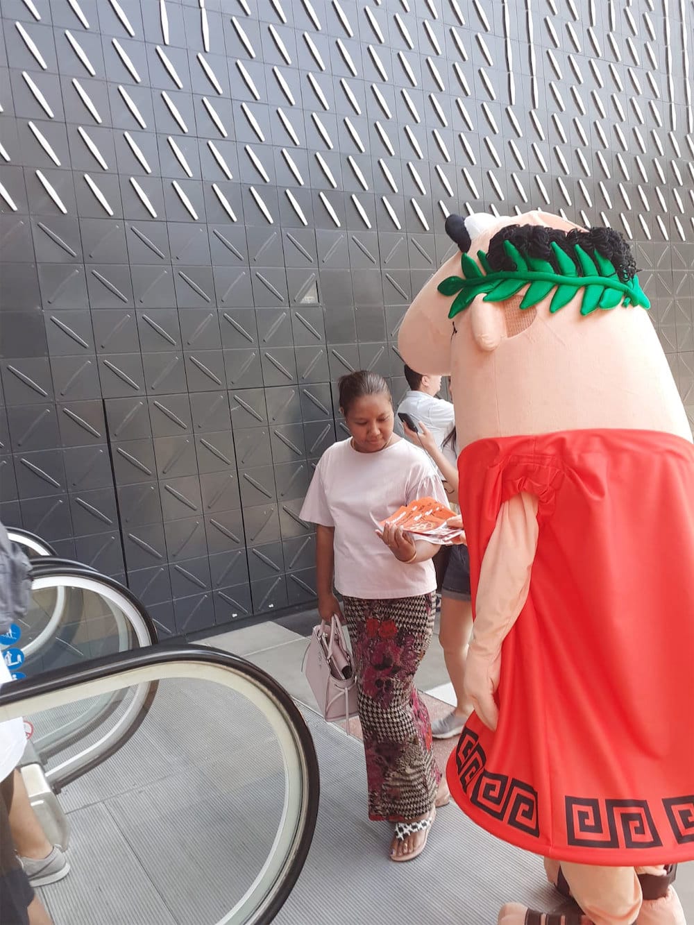 funan caesar pizza walkway mascot flyer distribution with people 2