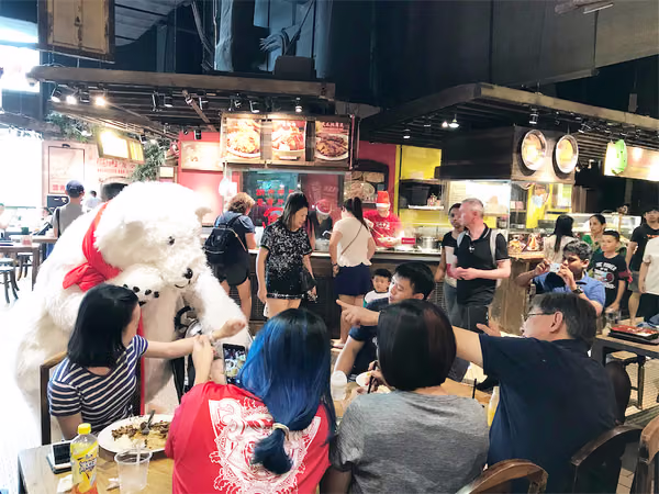 Coke bear at food republic events marketing interacting with customers