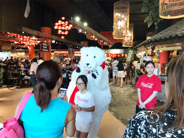 Coke bear at food republic events marketing posing for photo with customer 6