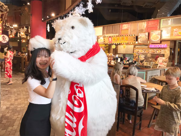 Coke bear at food republic events marketing posing for photo with promoter