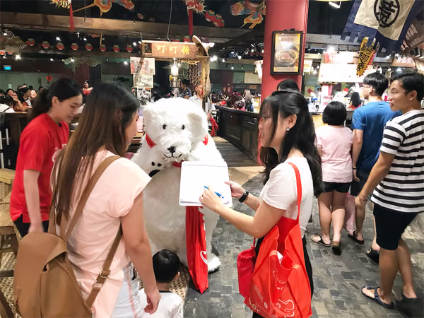 Coke bear at food republic events marketing promoter working