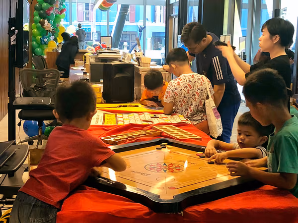 Indian Heritage Center Events flyer distribution marketing booth with children playing games 2
