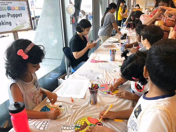 Indian Heritage Center Events flyer distribution marketing booth with children playing games 3