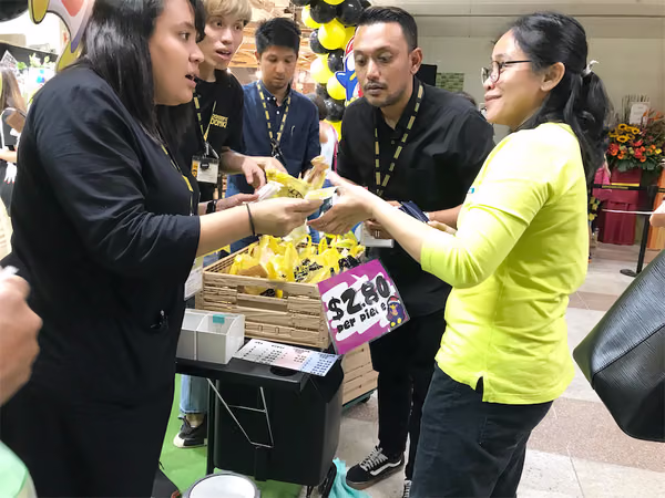 don don donki at novena event handing out sweet potatos 4