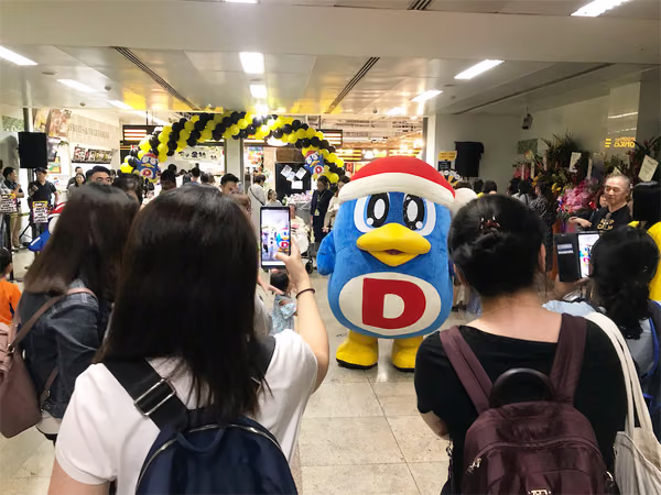 don don donki at novena event mascot with people posing for photo 4