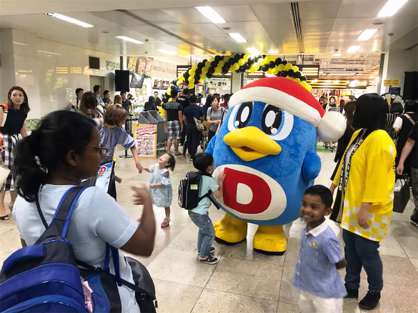 don don donki at novena event mascot with people posing for photo 5