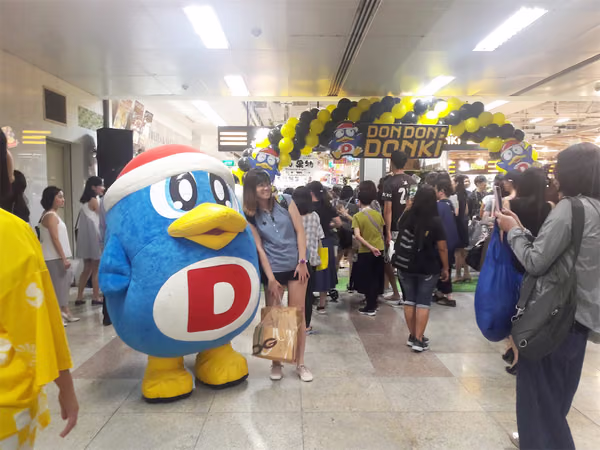 don don donki at novena event mascot with people posing for photo 6