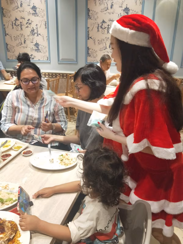 santa and assistant at food republic events marketing interacting with people 5
