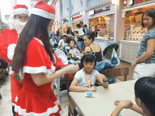 santa and assistant at food republic events marketing interacting with people