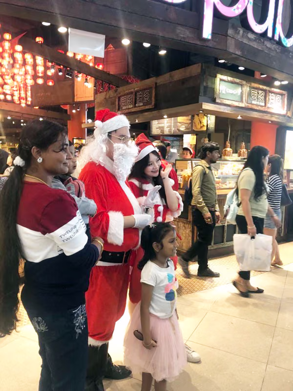 santa and assistant at food republic events marketing posing for photos 15