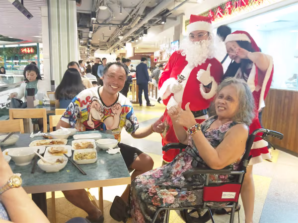 santa and assistant at food republic events marketing posing for photos 2