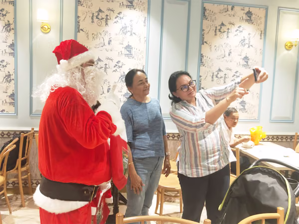 santa and assistant at food republic events marketing posing for photos 3