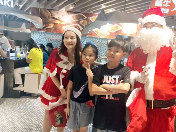 santa and assistant at food republic events marketing posing for photos 4