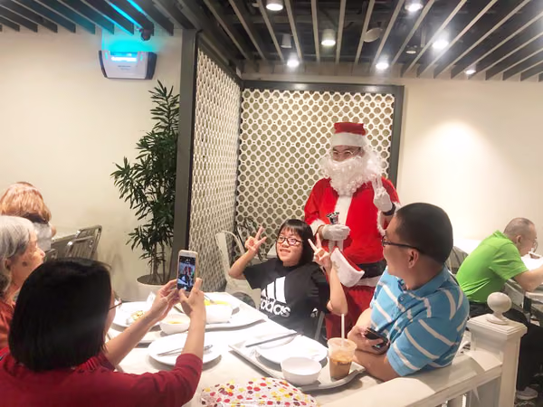 santa and assistant at food republic events marketing posing for photos 6