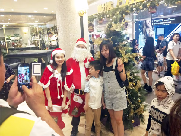 santa and assistant at food republic events marketing posing for photos